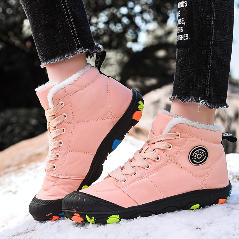 Kids waterproof winter boots with warm fleece lining, wide toe box, and non-slip grip sole