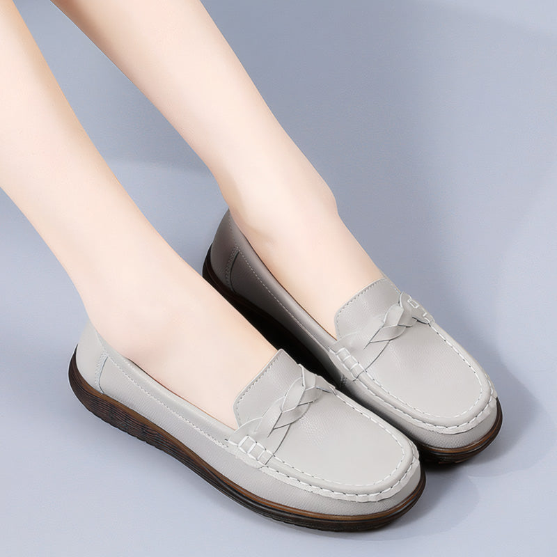 Women's wide fit leather slip-on loafers in neutral tone with orthopedic arch support design