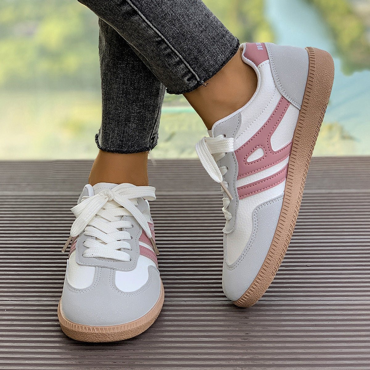 Women's retro suede trainers in neutral tones, vintage 70s athletic silhouette with arch support