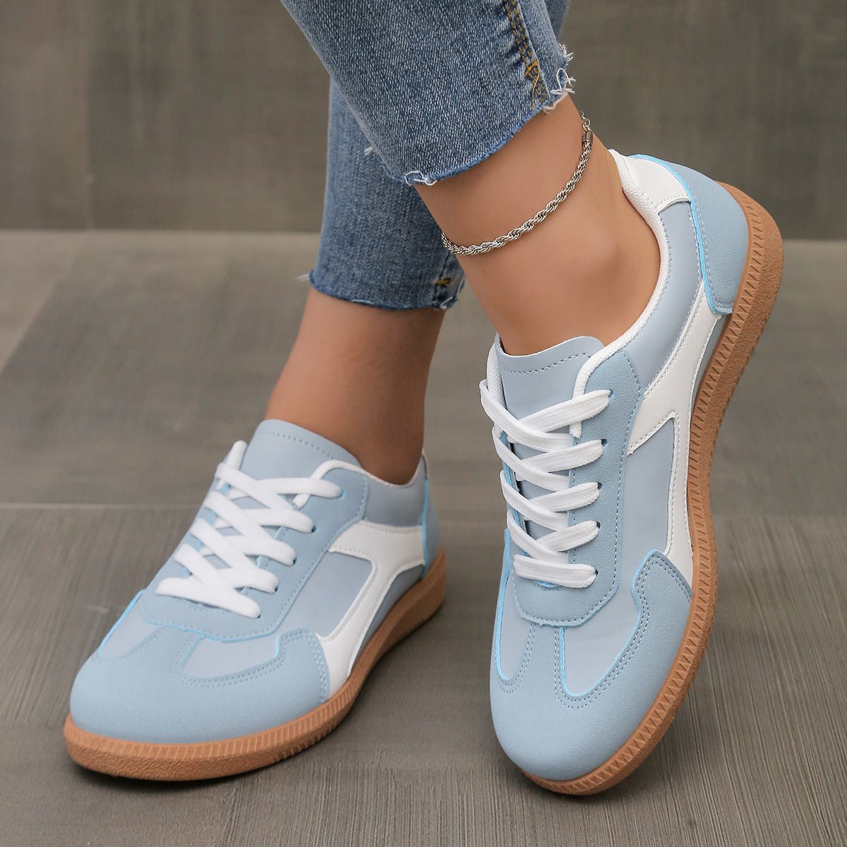 Women's retro suede trainers in neutral tones with arch support and 70s-inspired athletic silhouette
