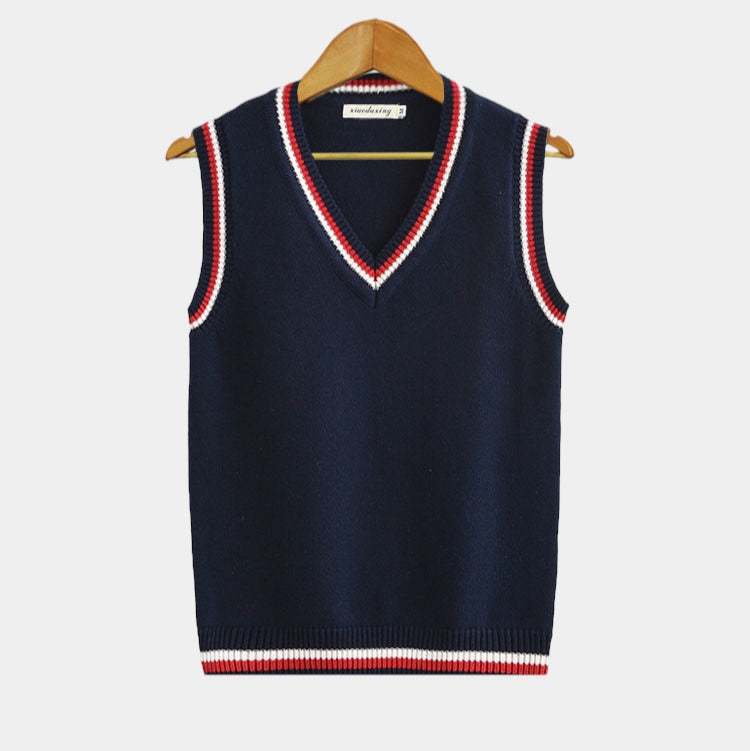Men's navy cable knit sleeveless sweater vest with V-neck for smart casual layering