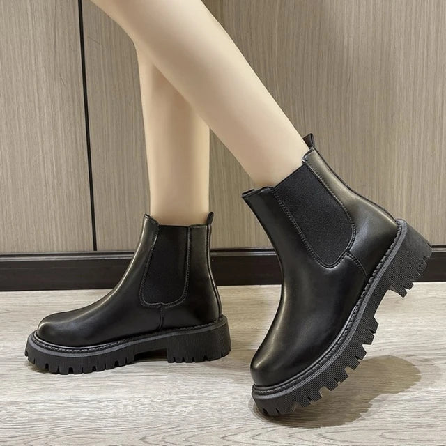 Women's black Chelsea boots with chunky anti-slip sole and durable PU leather classic silhouette