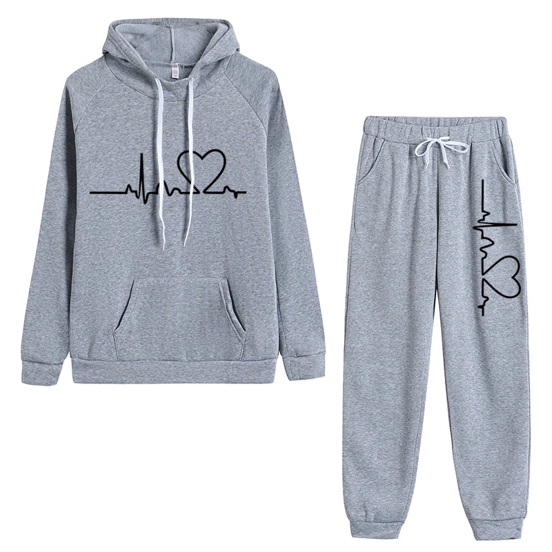 Women's hoodie and pants set neutral tones relaxed fit timeless pattern two-piece lounge outfit