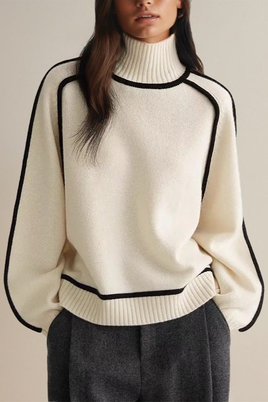 Women's relaxed knit turtleneck sweater with ribbed detailing and contrast piping trim