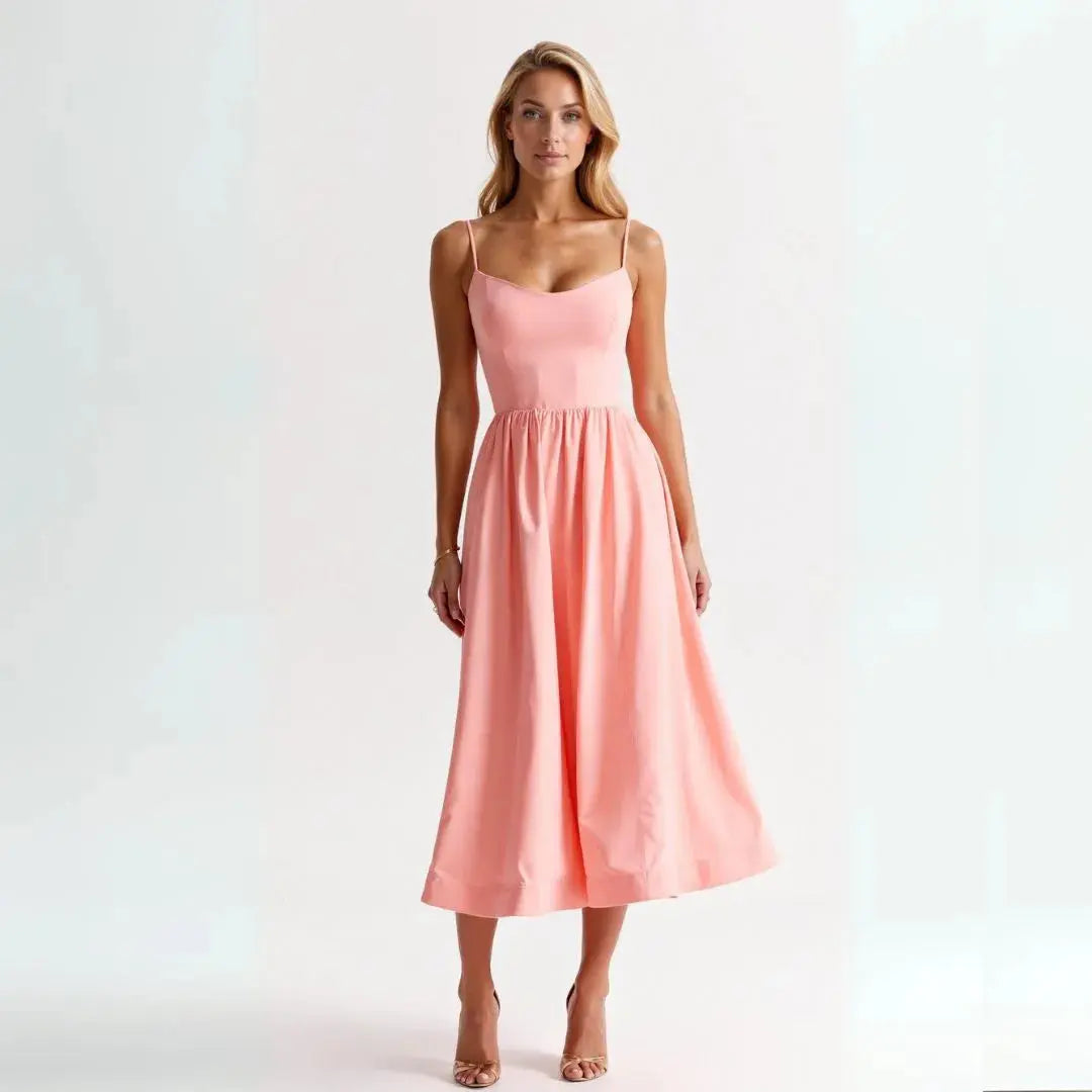 Flowy midi dress spaghetti straps sweetheart neckline fit-and-flare silhouette romantic feminine style