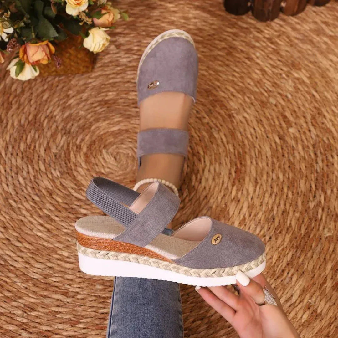 Women's closed-toe faux suede wedge sandals with jute-wrapped espadrille platform and supportive straps