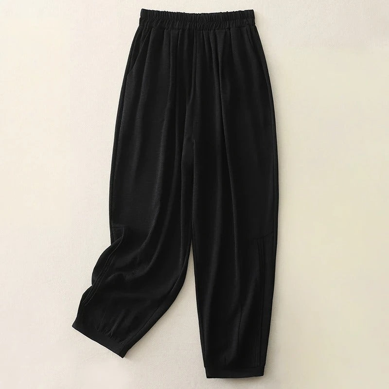 Women's beige relaxed-fit linen blend pants with elastic waist and tapered leg silhouette