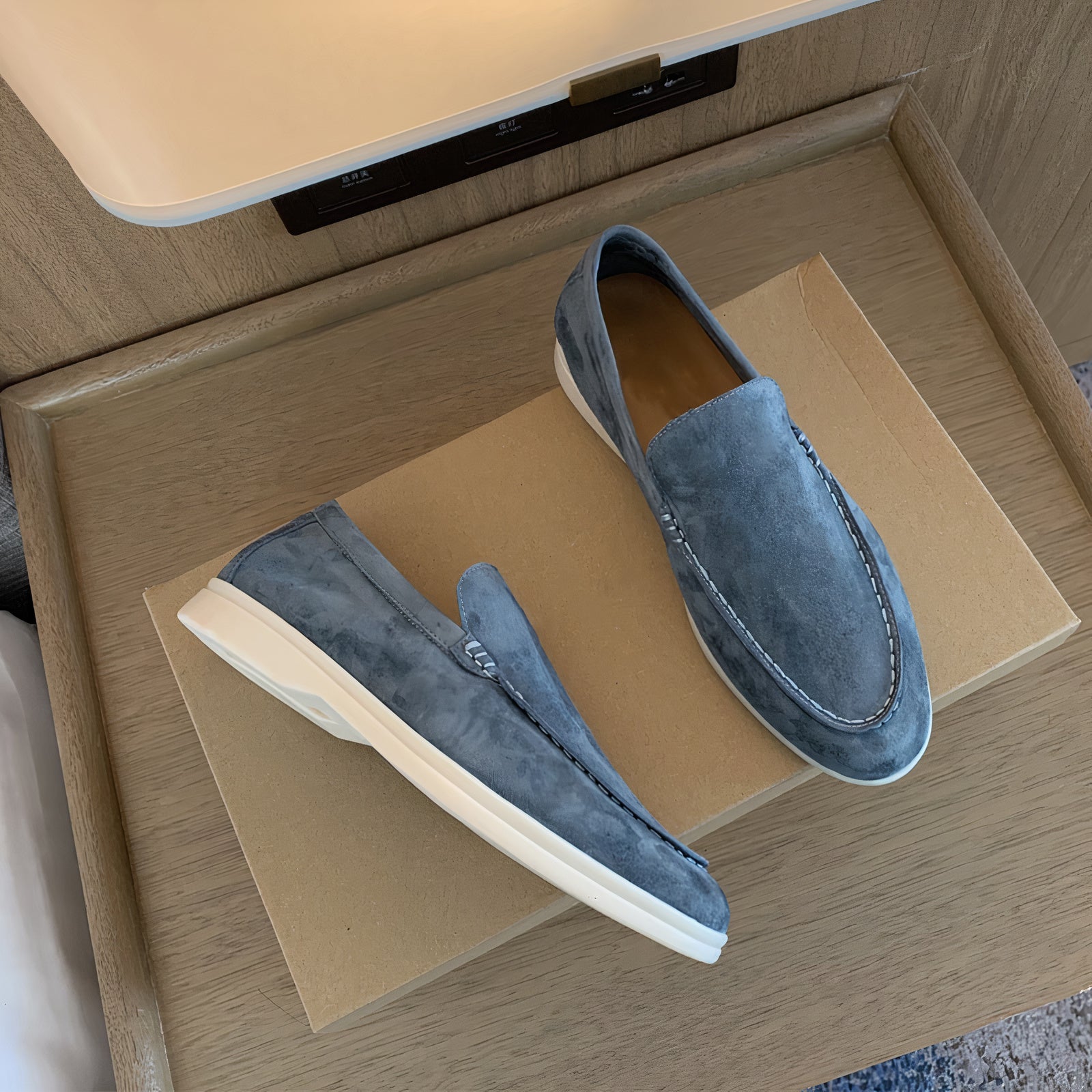 Classic slip-on leather loafer moccasin with stitched detailing, unisex elegant timeless style
