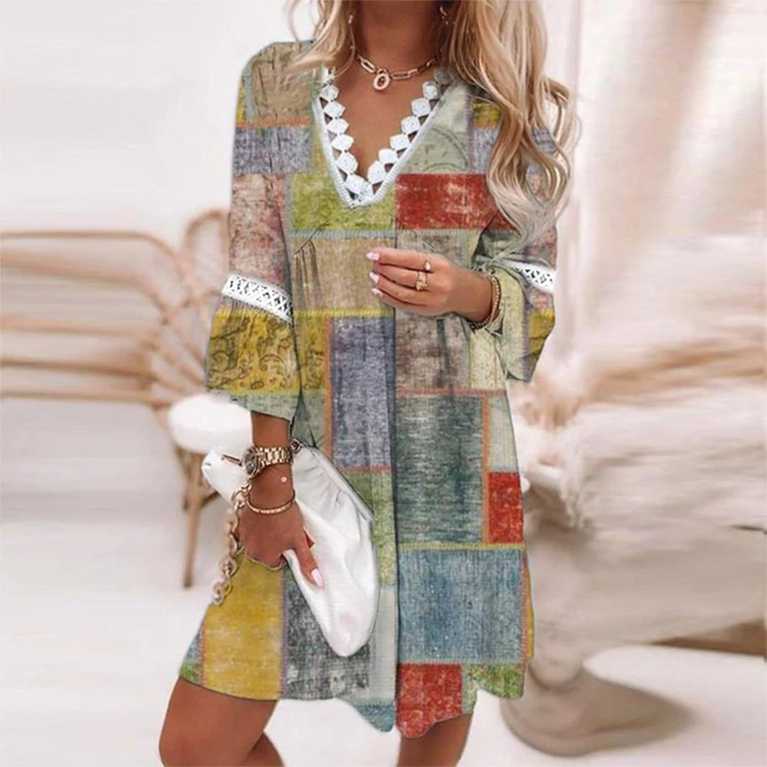 Floral A-line summer dress with scalloped V-neck, bell sleeves, and delicate lace trim details