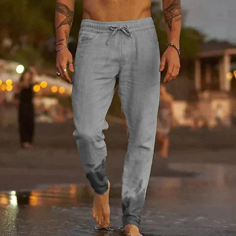 Men's gray relaxed-fit cotton jogger pants with adjustable drawstring waistband for everyday comfort