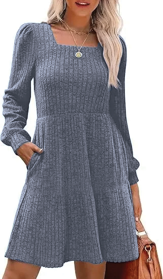 Elegant white mini dress with empire waist, square neckline, and charming doll pockets