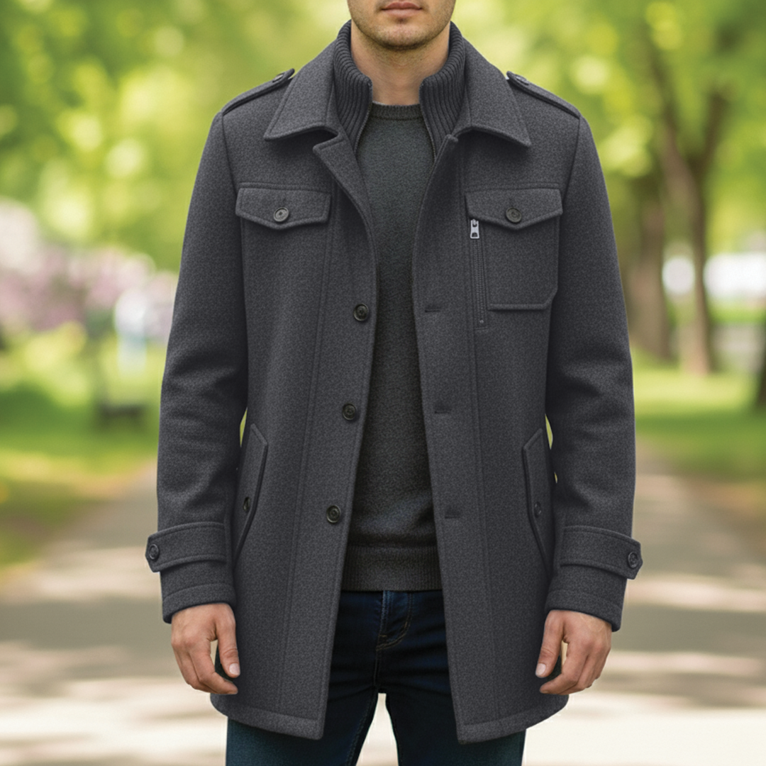Men's charcoal wool blend overcoat with notched lapel, button-zip closure, tailored polished fit