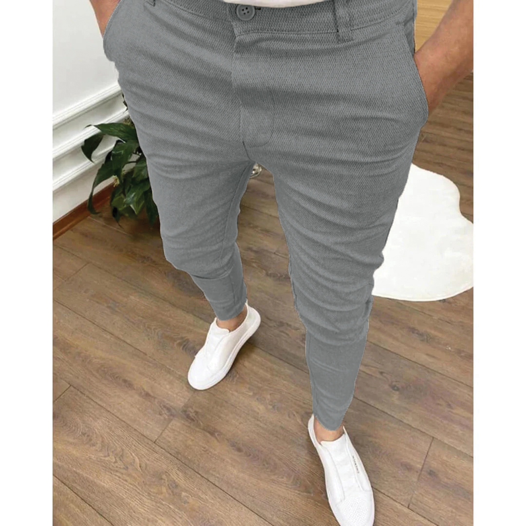 Men's slim fit tapered trousers in neutral tone with cropped ankle hem and all-season flex fabric
