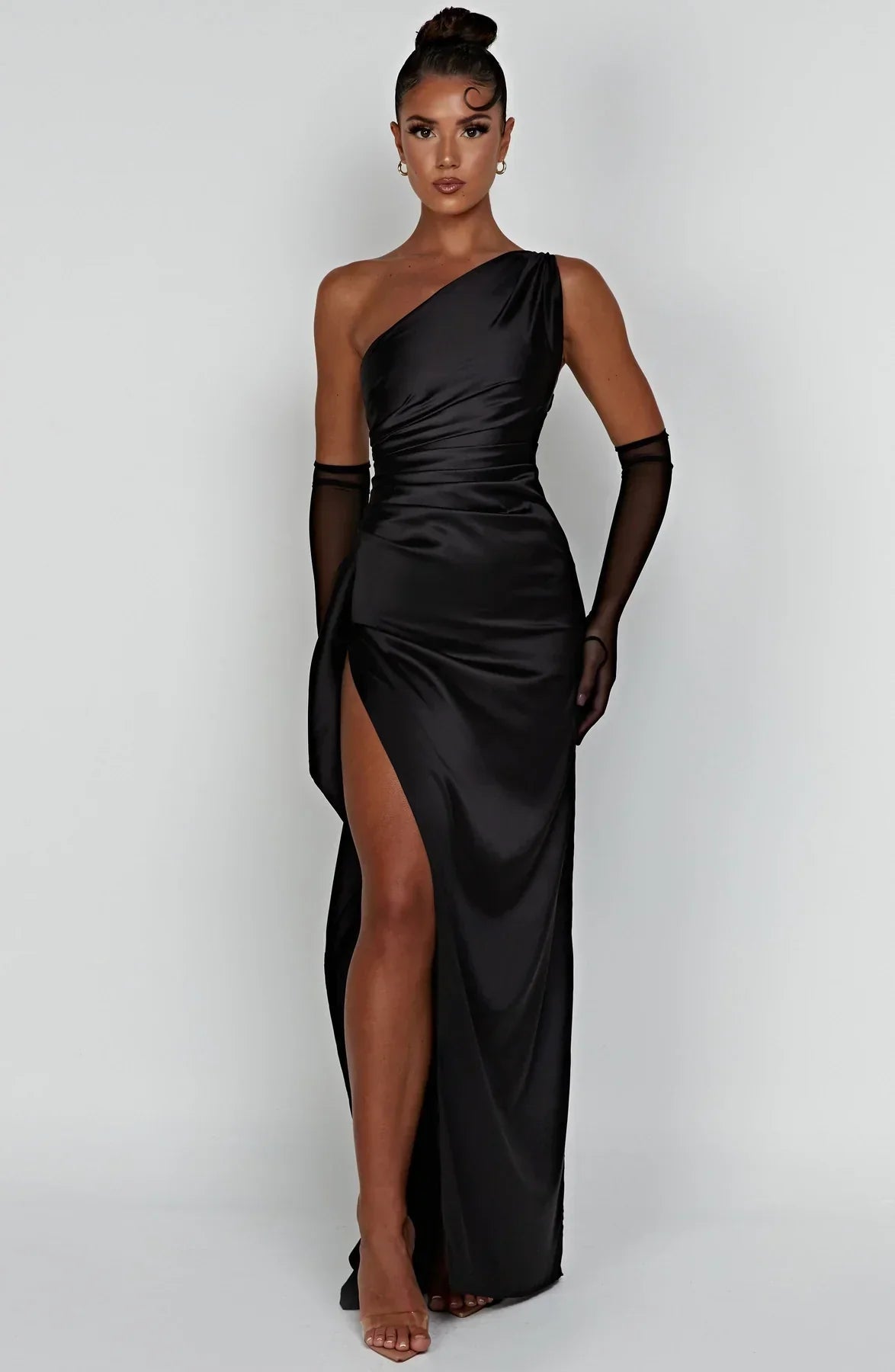 Glossy satin one-shoulder maxi gown in sleek body-hugging silhouette with thigh-high slit