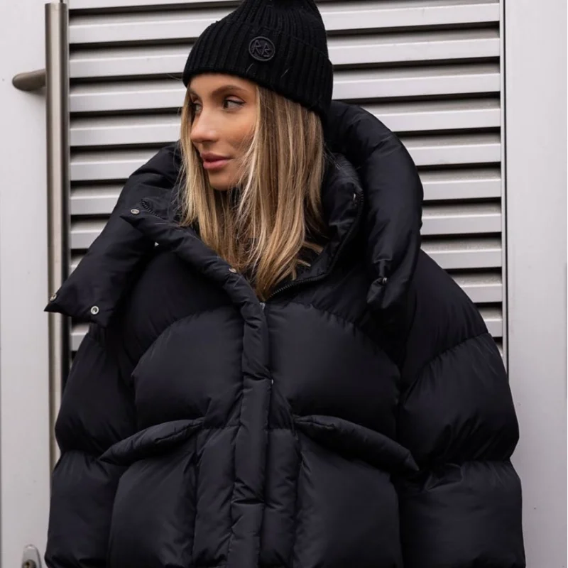 Women's oversized black puffer jacket with padded insulation, cozy street style winter coat