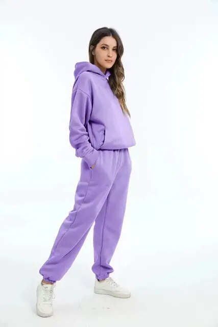 Women's cozy gray hoodie and sweatpants matching loungewear set with plush fabric for winter comfort