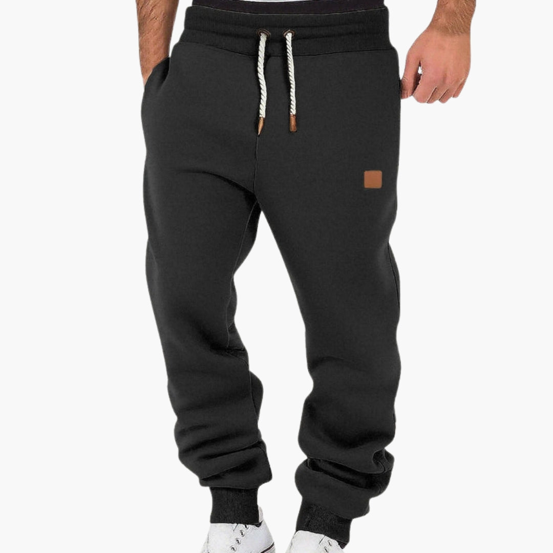 Men's gray fleece joggers relaxed fit tapered legs elastic drawstring waistband cozy daily wear