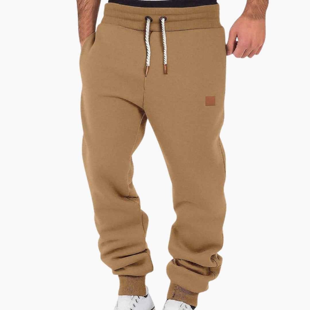 Men's gray fleece joggers relaxed fit tapered legs elastic drawstring waistband cozy daily wear