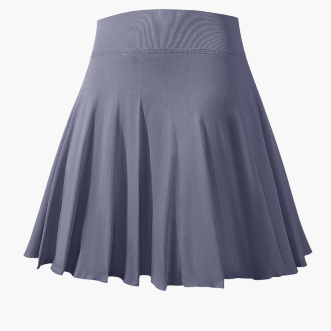 Women's white pleated sports skirt with elastic waistband, pull-on fit for active comfort