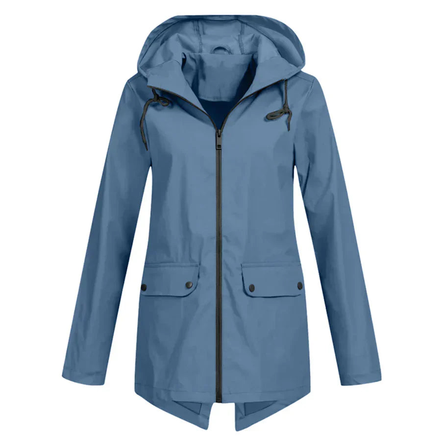 Women's waterproof hooded raincoat slate blue commuter style with front pockets clean silhouette