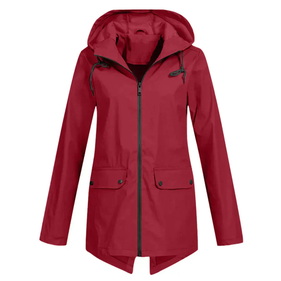 Women's waterproof hooded raincoat with front pockets, clean contemporary silhouette for commuters