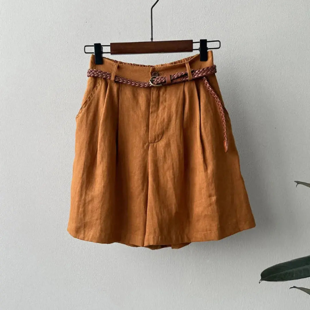 Women's high-waisted linen shorts with braided belt, relaxed pleated fit, natural beige tone