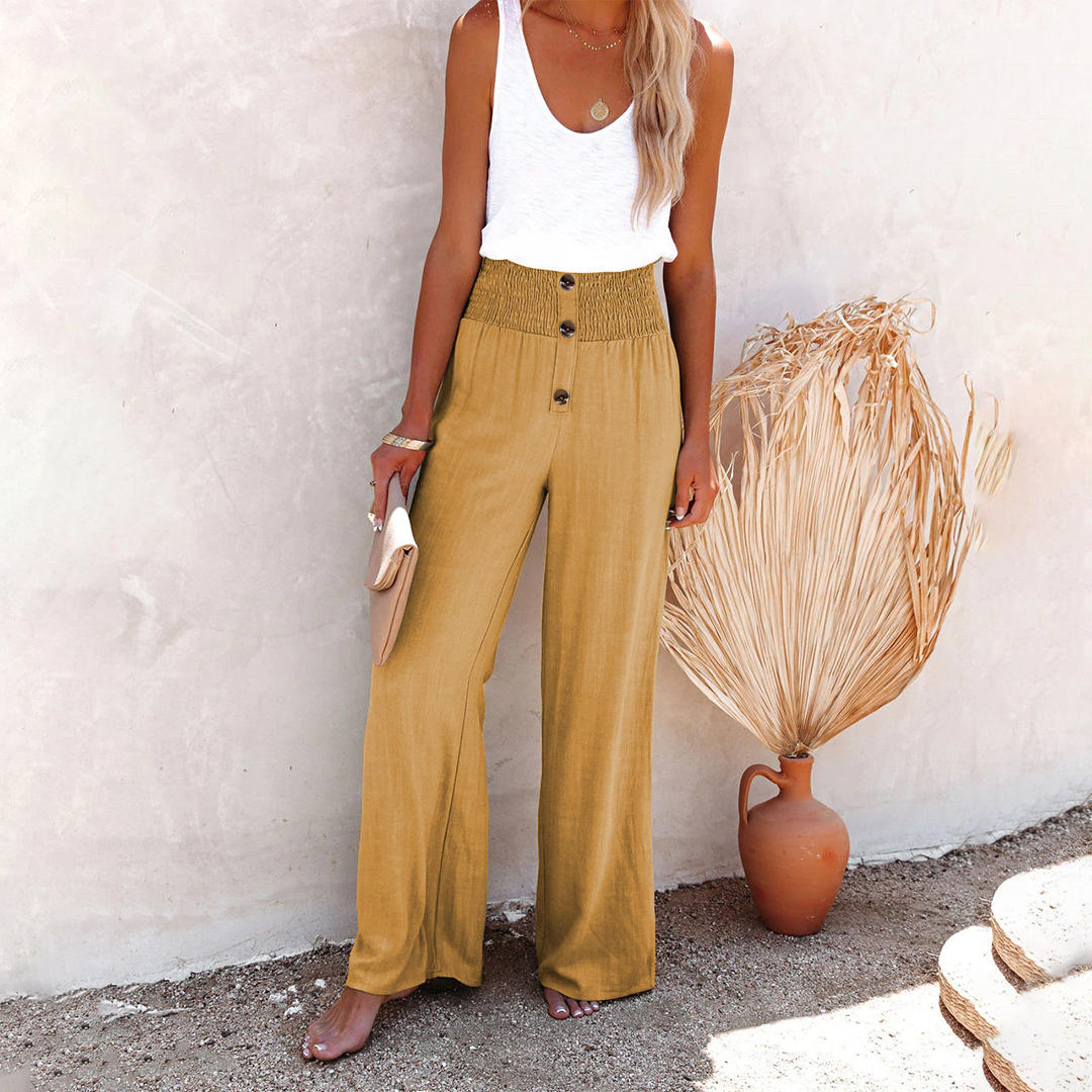Women's boho wide-leg travel trousers with high smocked waist, relaxed chic silhouette