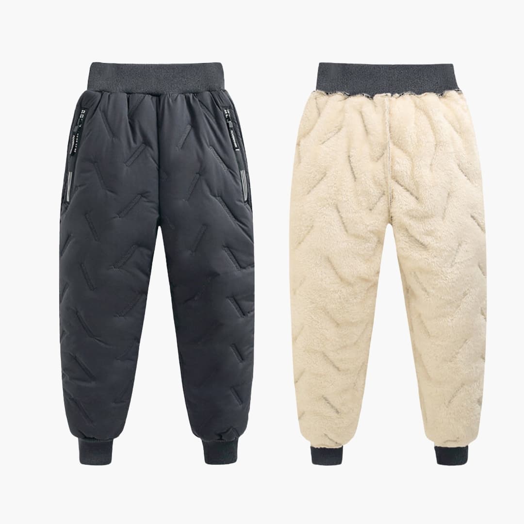 Kids navy quilted winter pants with fleece lining, elastic waistband, and side zip pockets