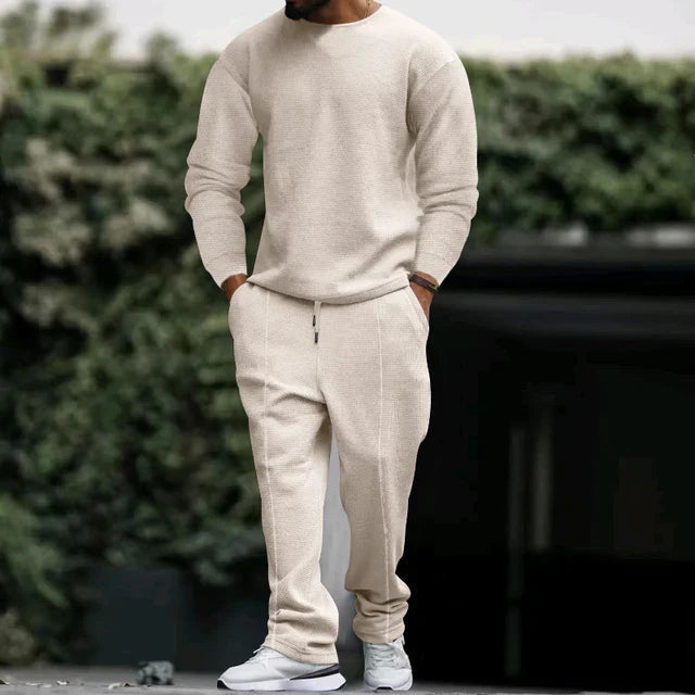 Men's classic navy blue tracksuit set with pullover and pants, polished athletic style for all-day wear