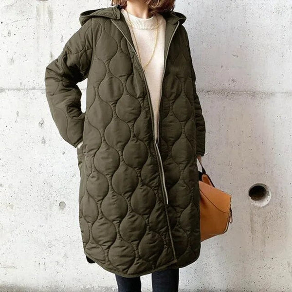 Women's relaxed fit quilted winter coat in neutral tone, effortless warmth with trendy oversized silhouette