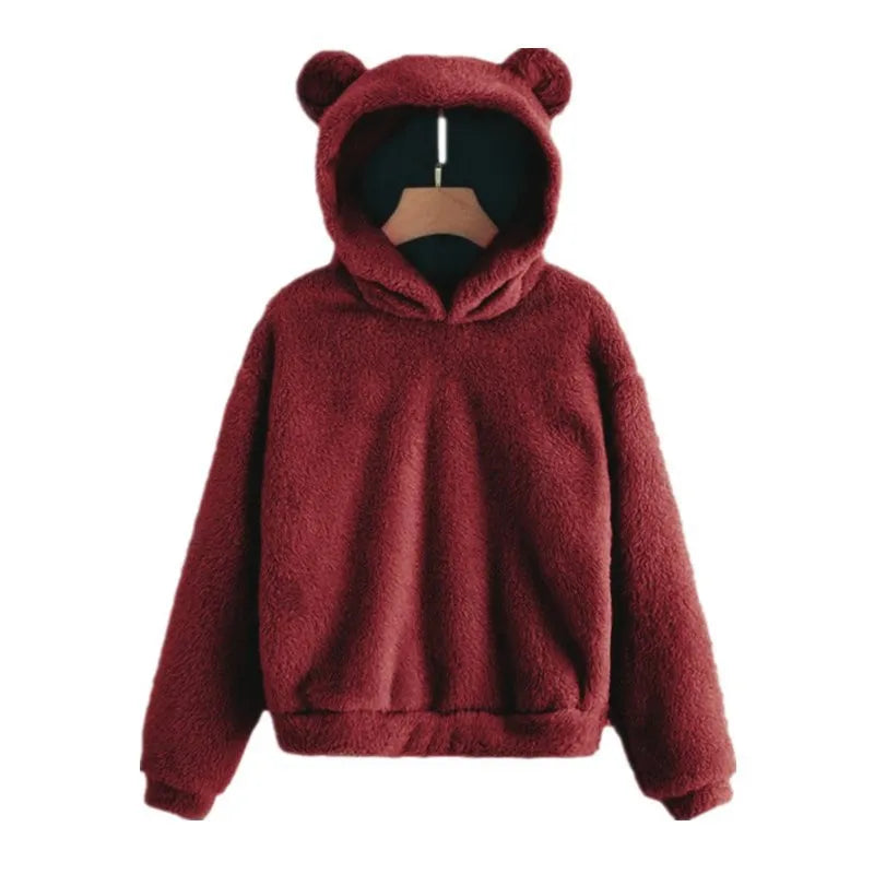 Women's plush hoodie with bunny ears, cozy soft winter casual style in warm neutral tones