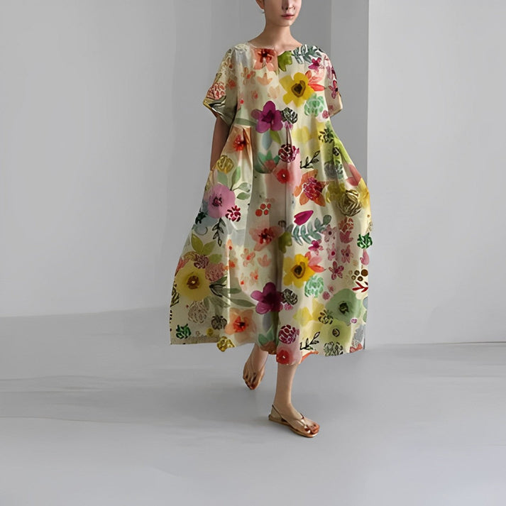 Women's relaxed fit floral midi dress with bold oversized botanical print in airy lightweight fabric