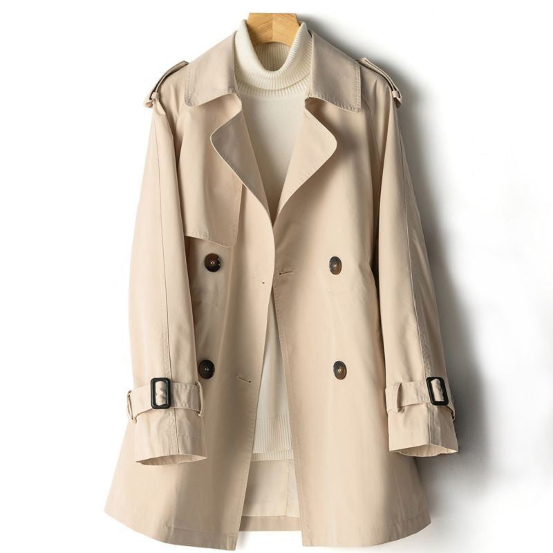 Lightweight beige poly-blend trench coat classic silhouette weatherproof luxury outerwear urban style