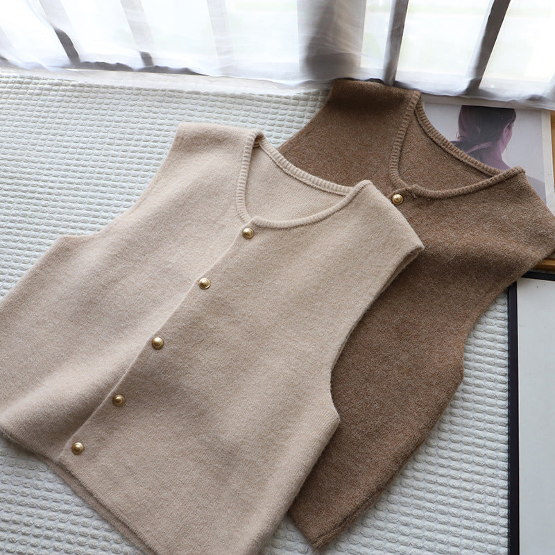 Ivory silky-soft knitted vest with refined button closure and elegant draped silhouette
