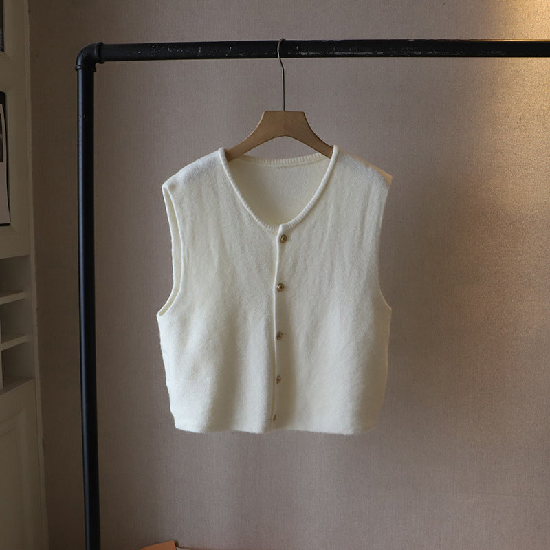 Ivory silky-soft knit vest with elegant button closure and graceful draping silhouette