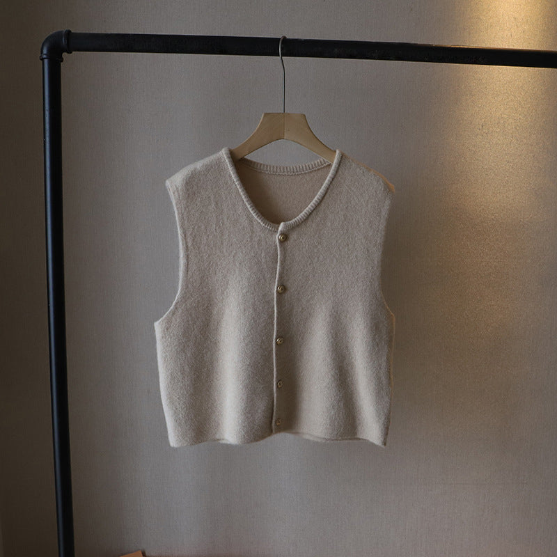 Women's wool blend cropped knit vest with button front closure, perfect for layered styling