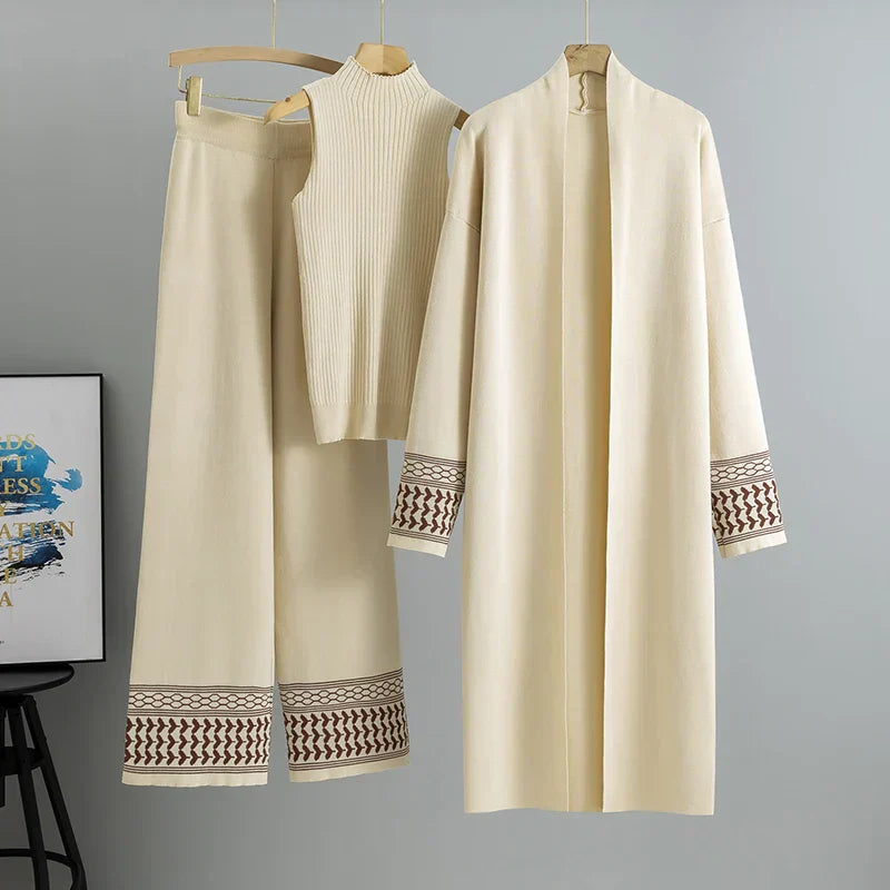Ivory three-piece ribbed set sleeveless top wide-leg pants longline open jacket quiet luxury style