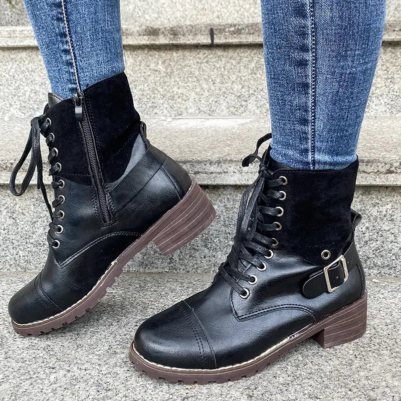 Women's black lace-up fashion boots with combat-inspired silhouette, thick heel, and round toe