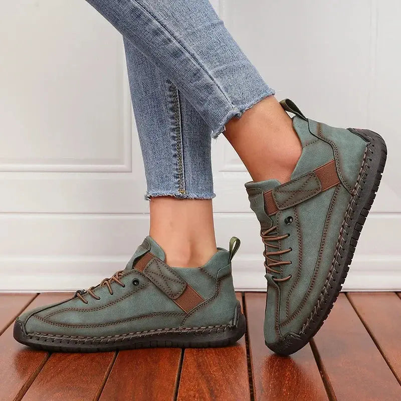 Women's retro lace-up mid-calf boots in classic tones with padded ankle support and anti-slip sole