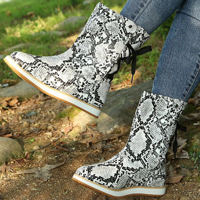 Women's brown suede-like lace-up mid-calf boots with flat rubber sole and secure adjustable fit