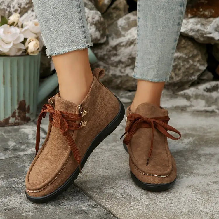 Women's faux suede lace-up winter boots with plush lining, insulated cold weather design