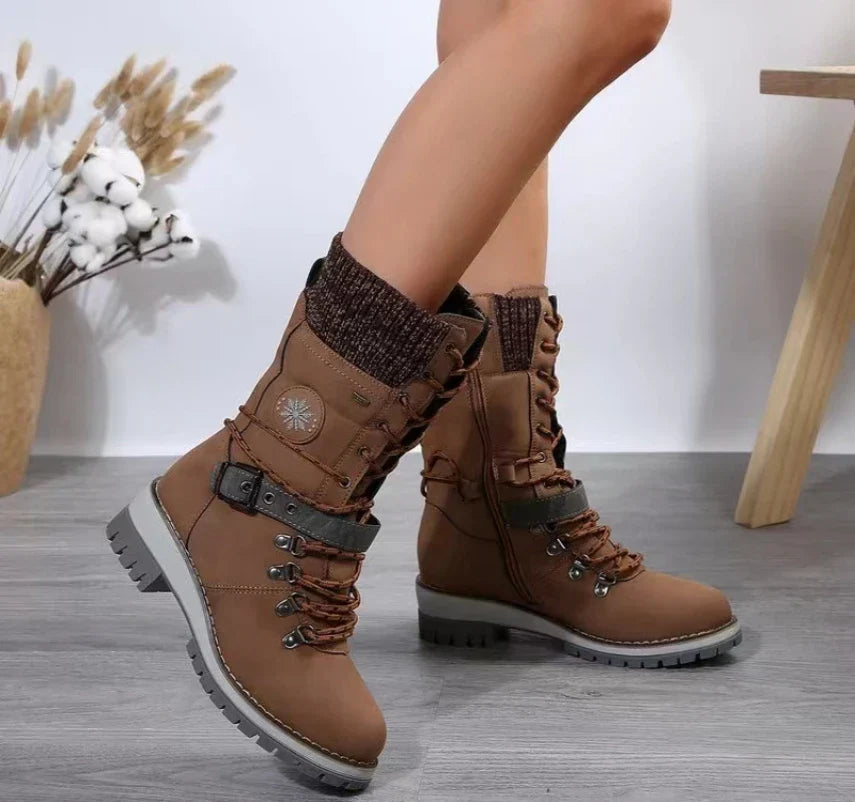 Women's brown lace-up ankle boots with chunky heel, buckle detail, and warm lining for winter