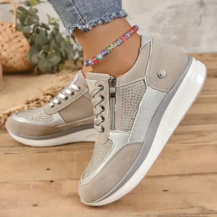 Women's white lace-up sneakers with side zipper, breathable fabric upper and cushioned sole