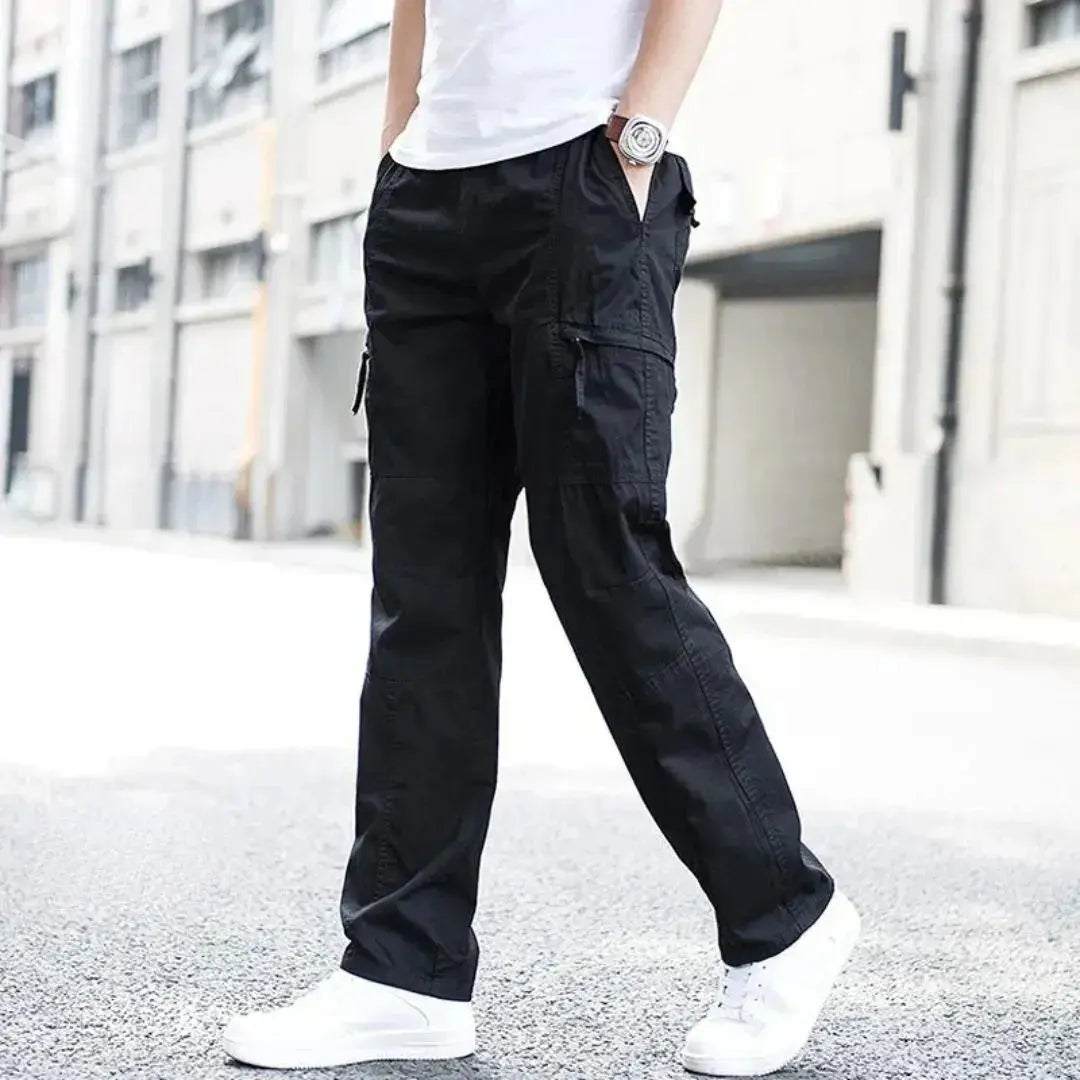 Olive green relaxed-fit cargo pants in organic cotton with 4-way stretch and multiple utility pockets