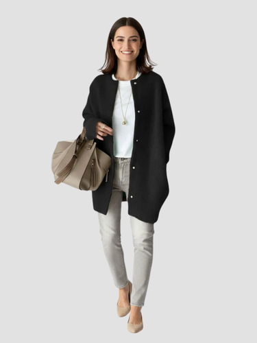 Women's long straight-cut cozy knit cardigan with minimalist button closure for timeless layering