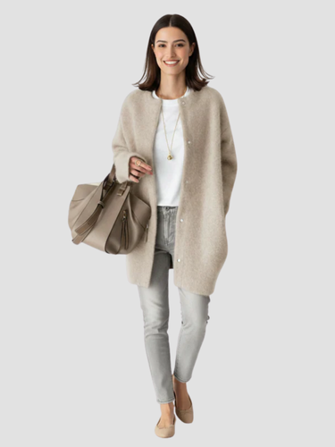 Women's long straight-cut cozy knit cardigan with minimalist button closure for timeless layering