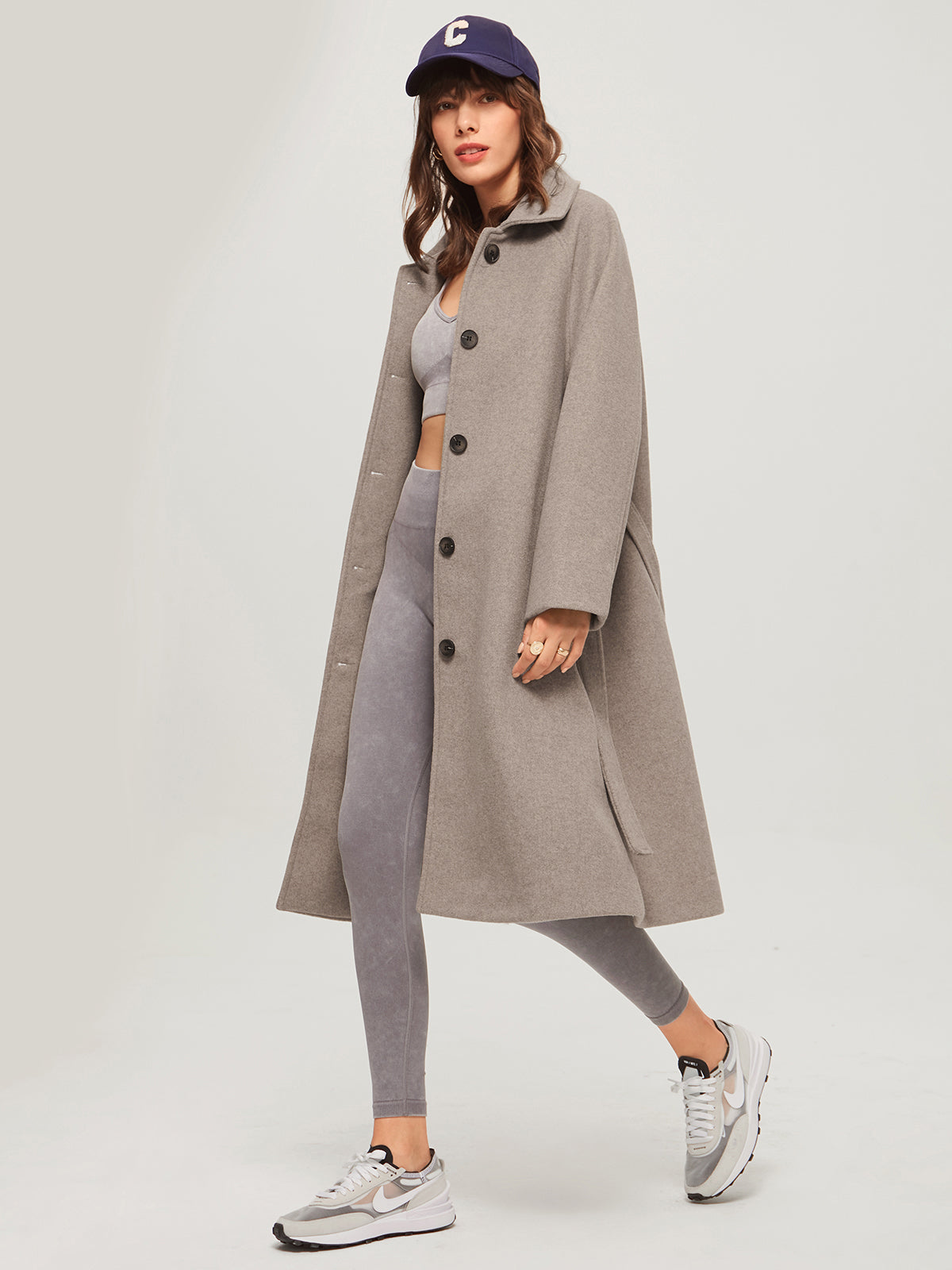 Women's long brushed wool coat with adjustable belted waist, elegant fit, timeless cold-weather outerwear