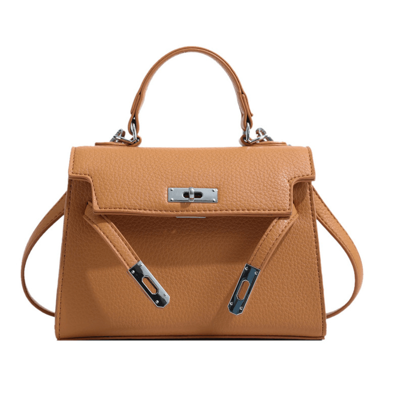 Laura women's structured top-handle handbag elegant silhouette spacious interior timeless design