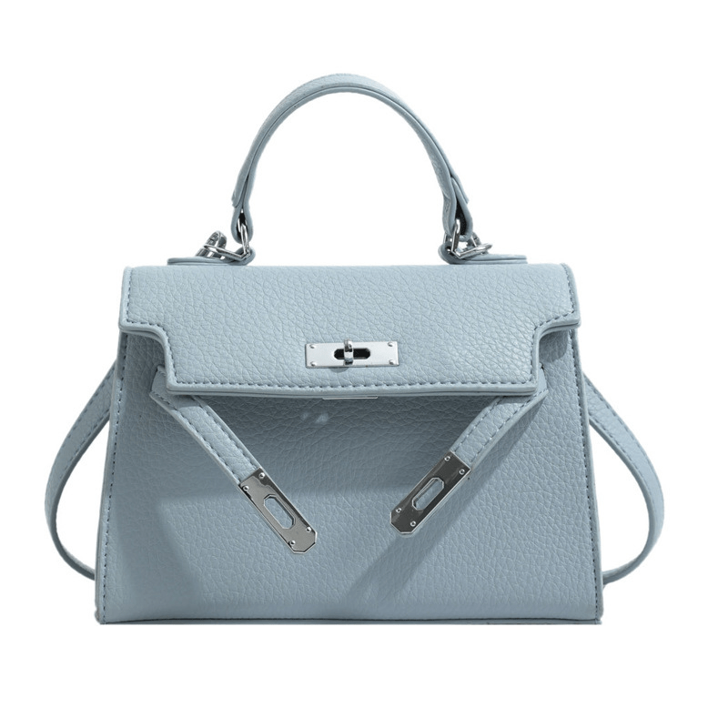 Laura women's structured top-handle handbag elegant silhouette spacious interior timeless design