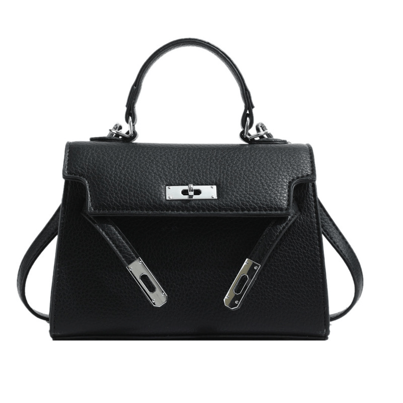 Laura women's structured top-handle handbag elegant silhouette spacious interior timeless design